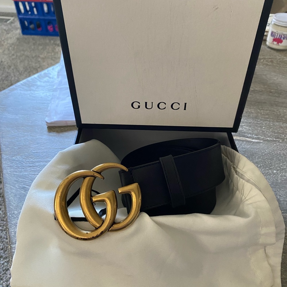 Gucci wide GG belt.